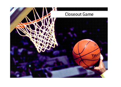 What is the meaning of the closeout game in basketball and hockey playoffs?  The term is explained.  In photo:  Boston Celtics player holding the ball next to the hoop.